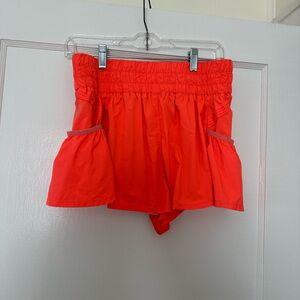 Free people orange running shorts